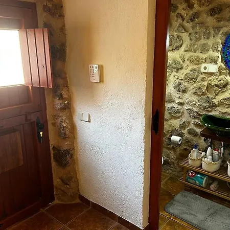 Rural Stone House With Wood Fireplace