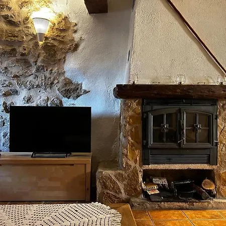 Rural Stone House With Wood Fireplace